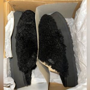 Black platform Ugg slides